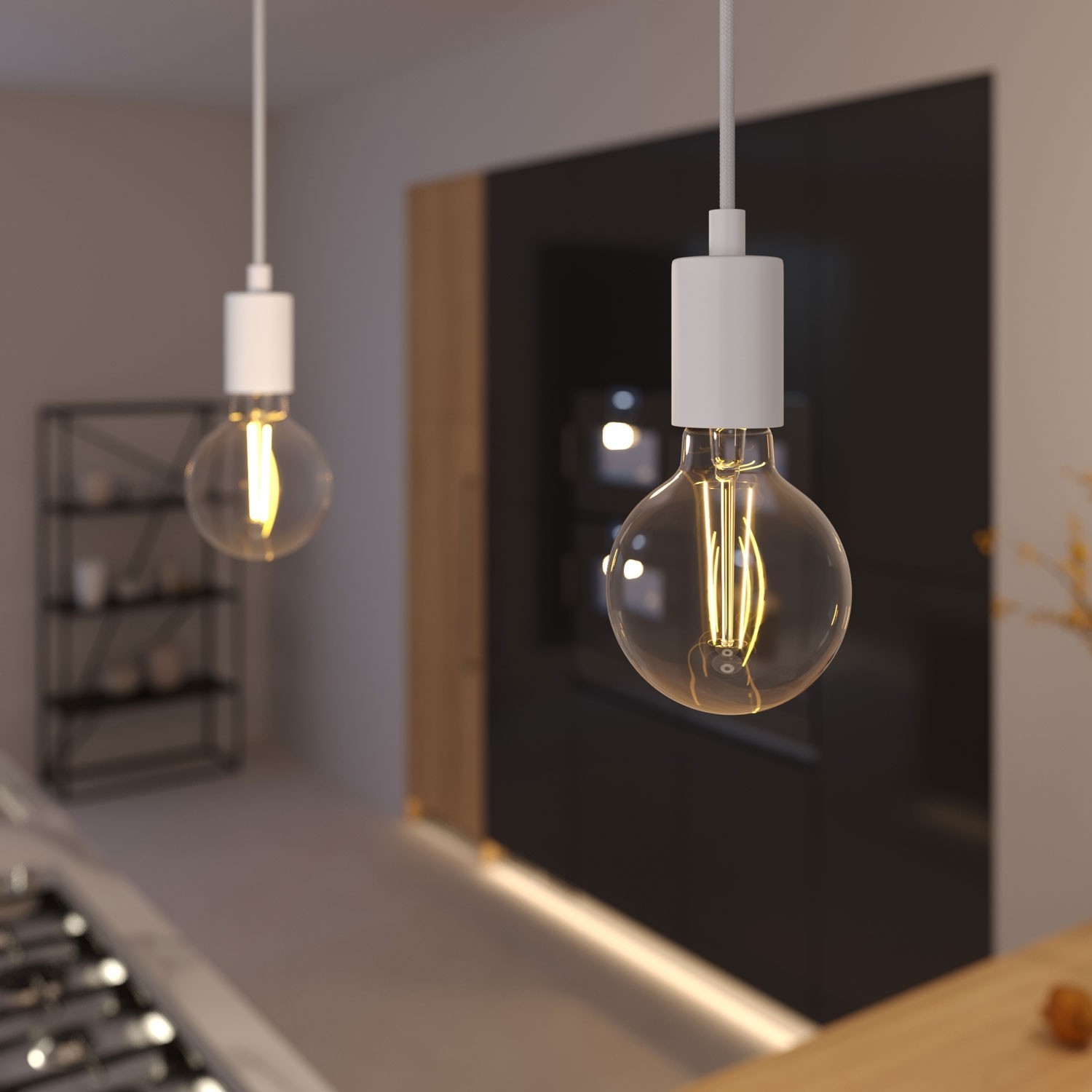 Pendant lamp with textile cable and monochrome metal details