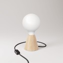 Table lamp with base in alder wood and matte white light bulb