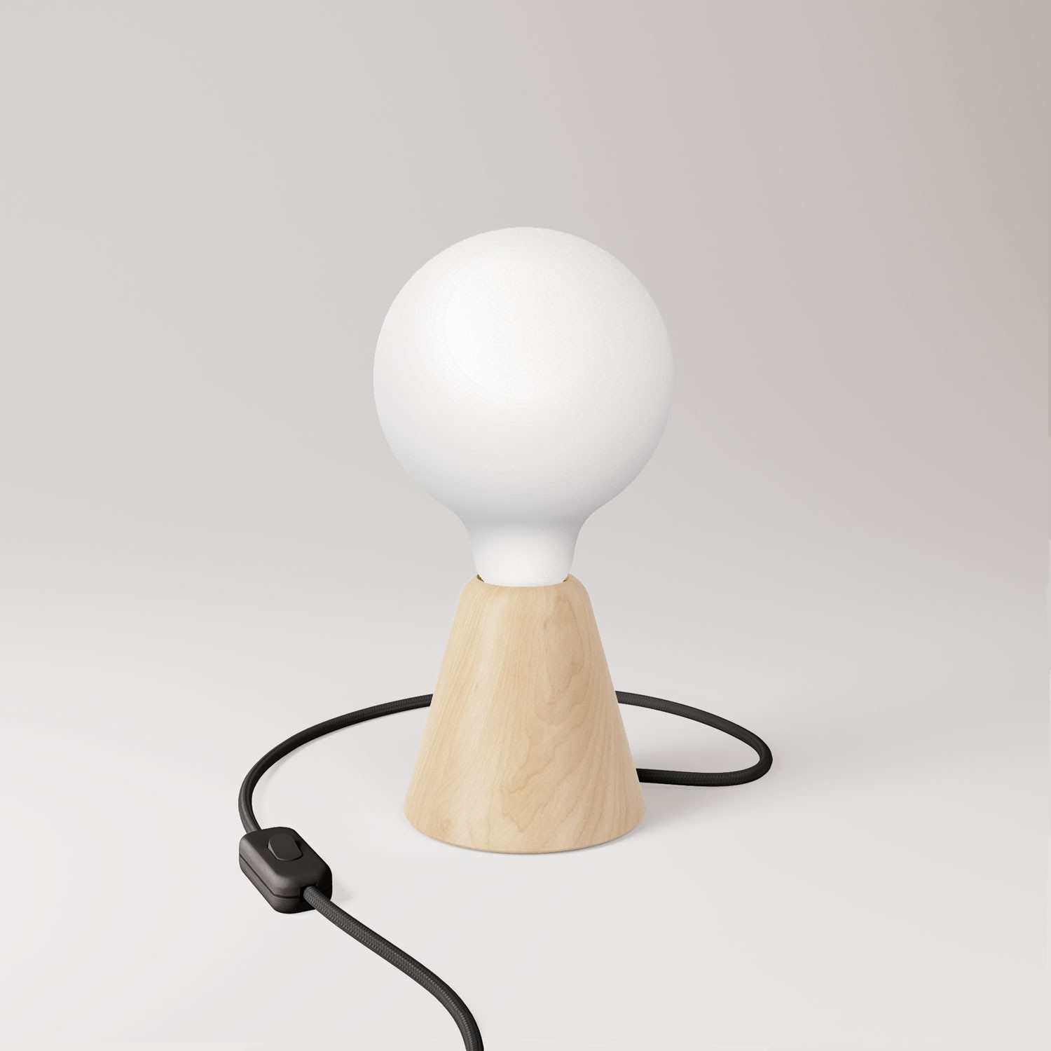 Table lamp with base in alder wood and matte white light bulb