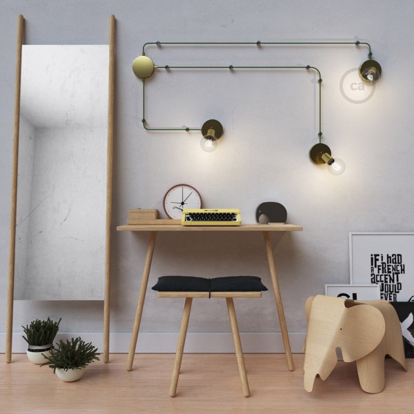 Spostaluce Metallo 90°, the brass adjustable light source with fabric cable and side holes